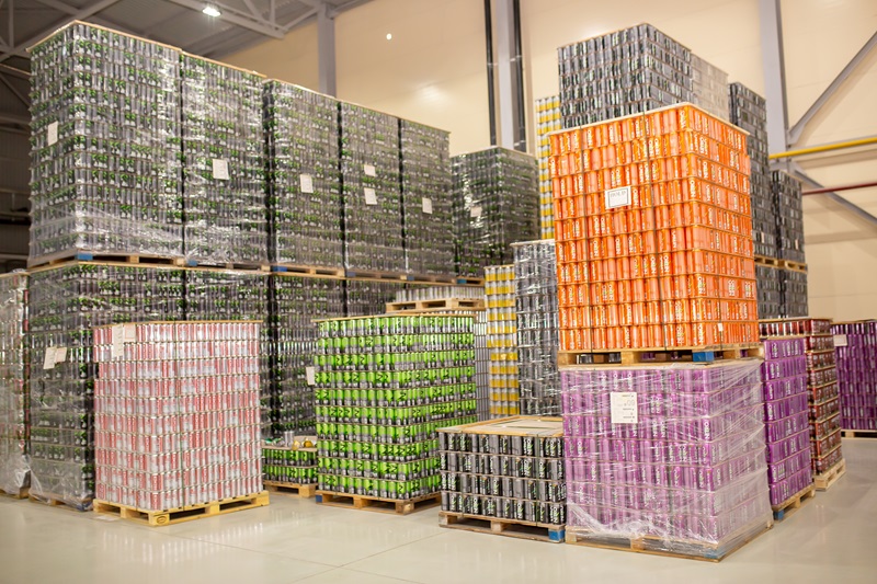 Colourful pallets in warehouse