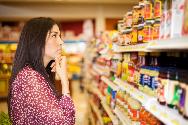Women looking at supermarket fixture